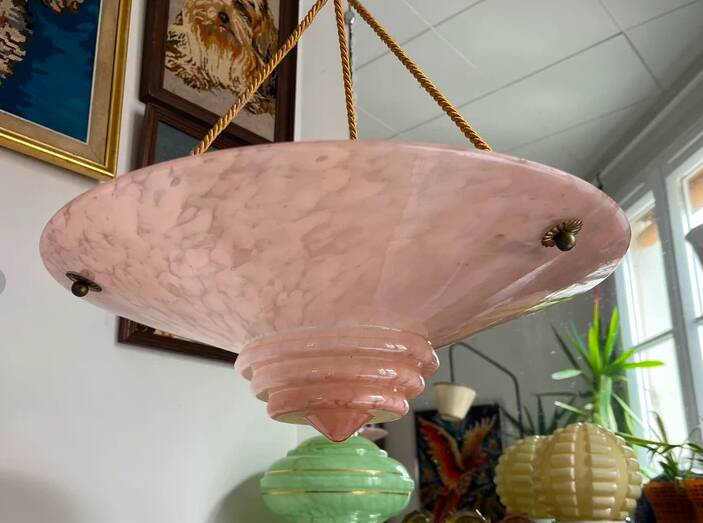 Art Deco basin suspension with pink glass and fabric cords.