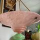 Art Deco basin suspension with pink glass and fabric cords.