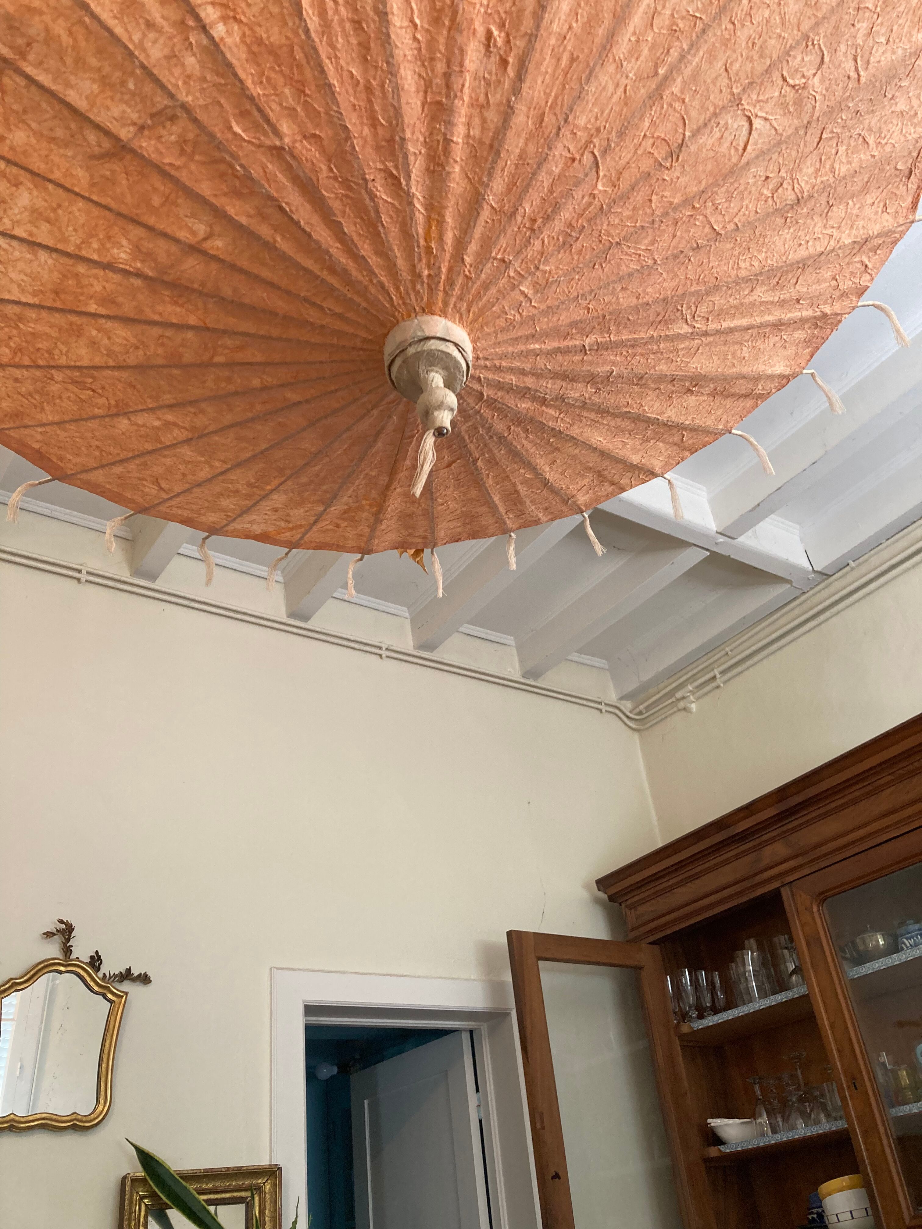 Powder pink paper umbrella and wooden handle