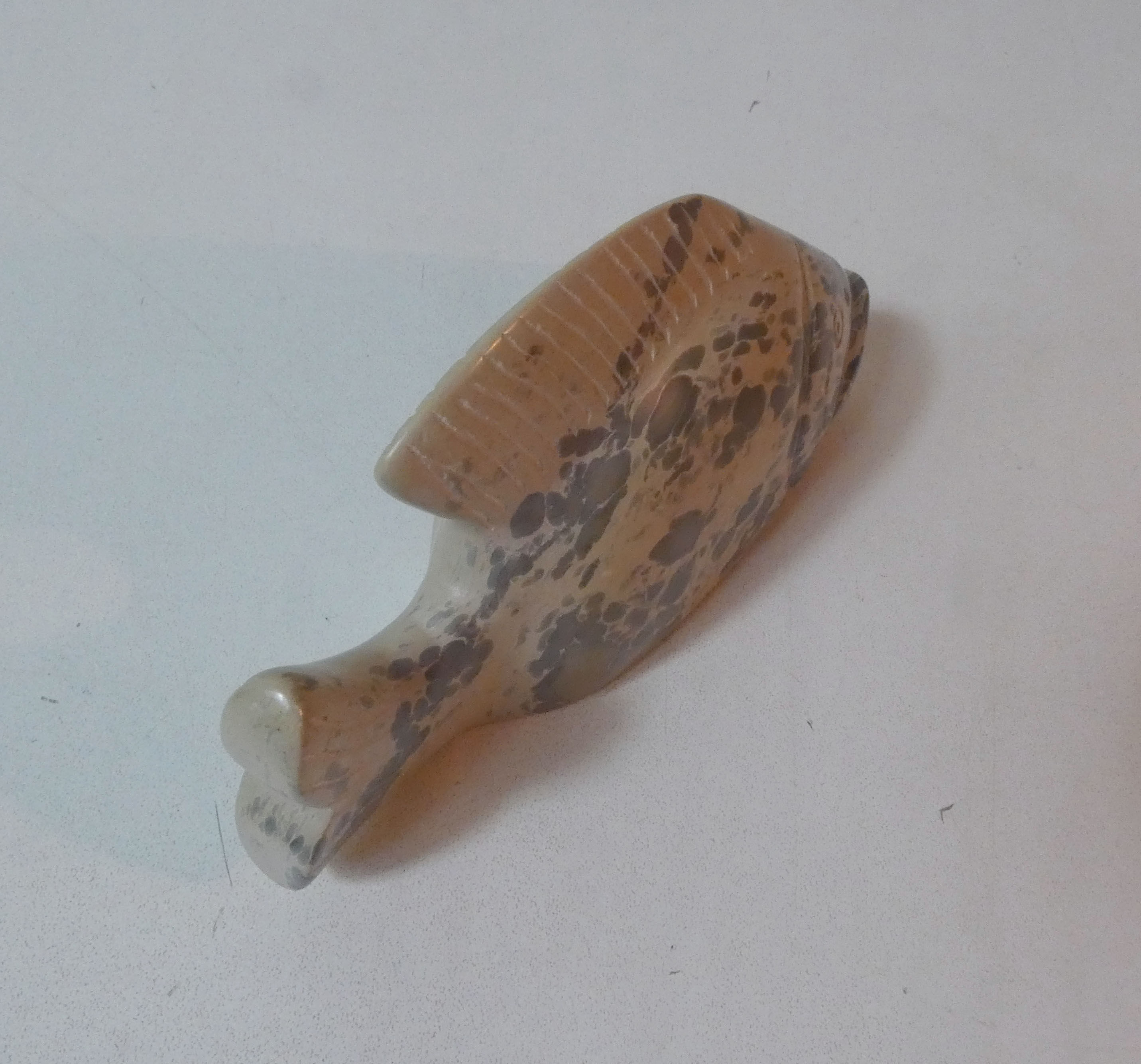 Polished stone fish vintage paper press