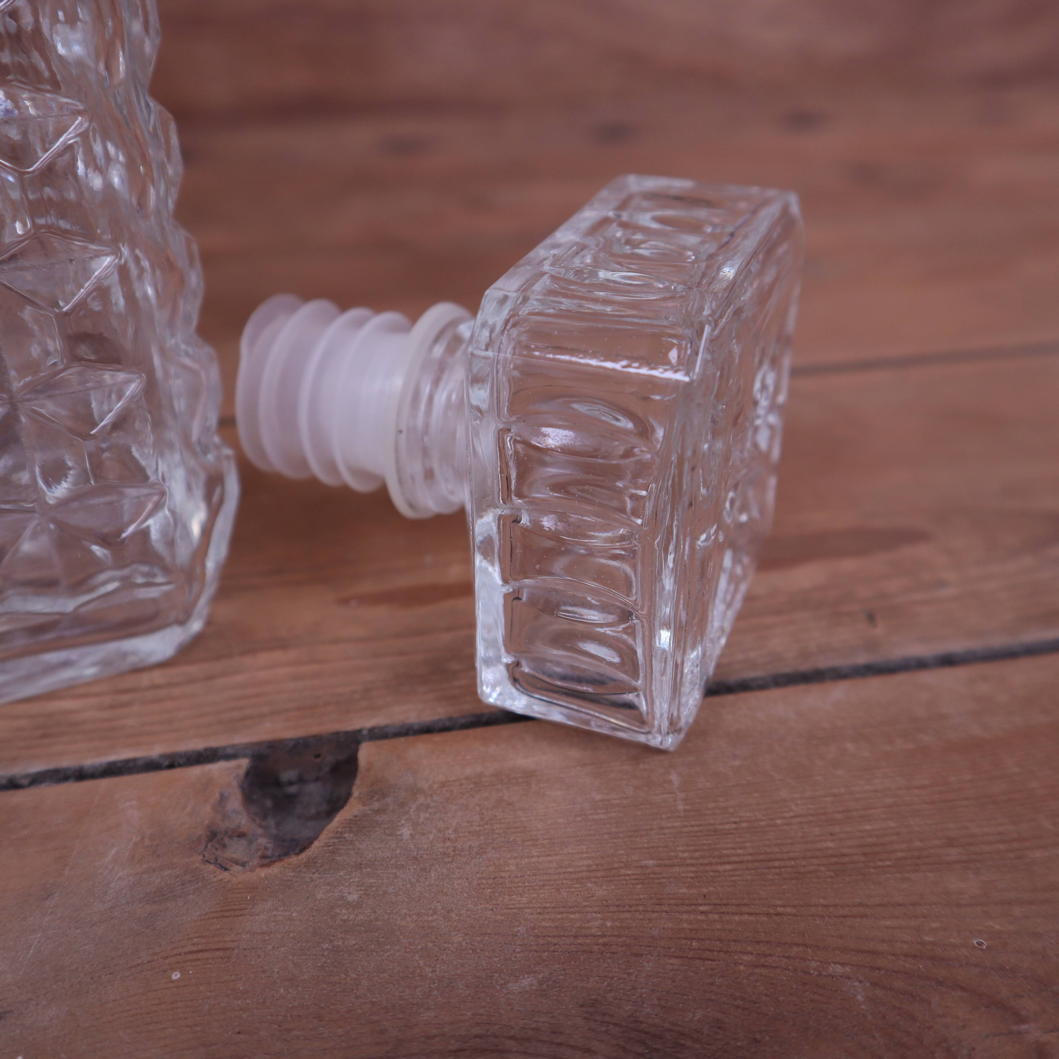 Vintage cut glass whisky decanter with diamond point design, 1960s.