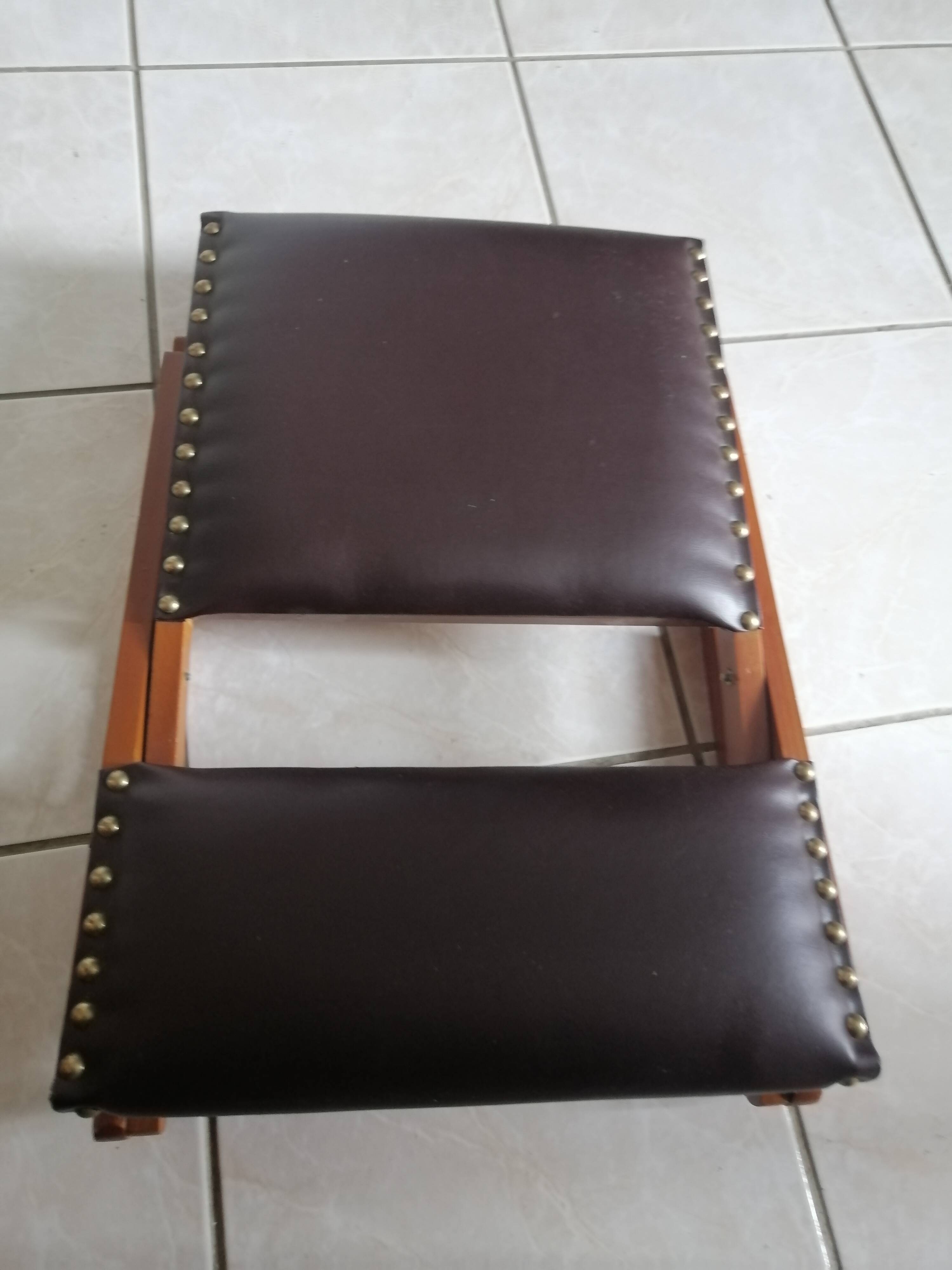 Vintage rocking footrests in wood and faux leather
