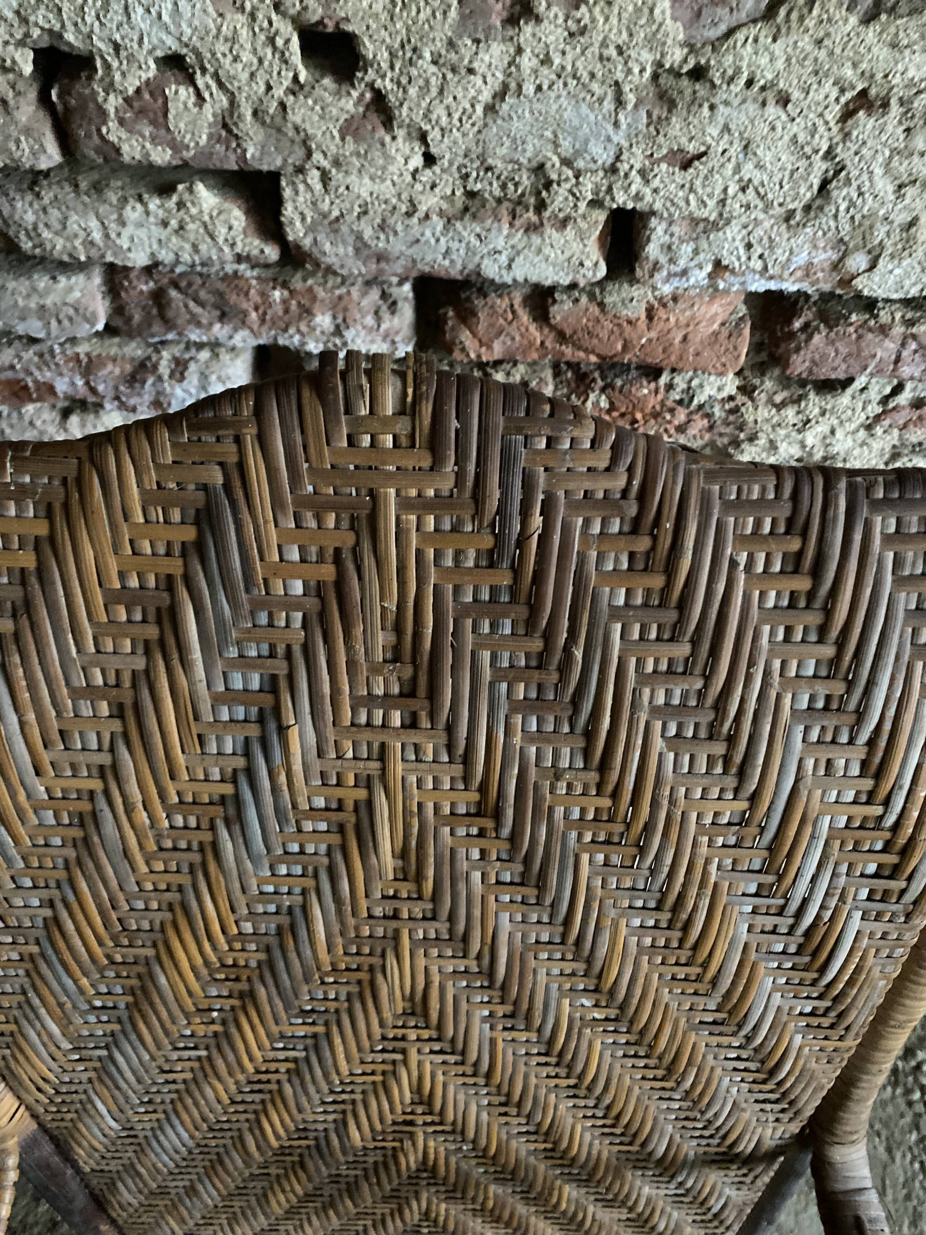 Braided rattan armchair