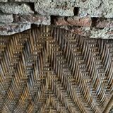 Braided rattan armchair