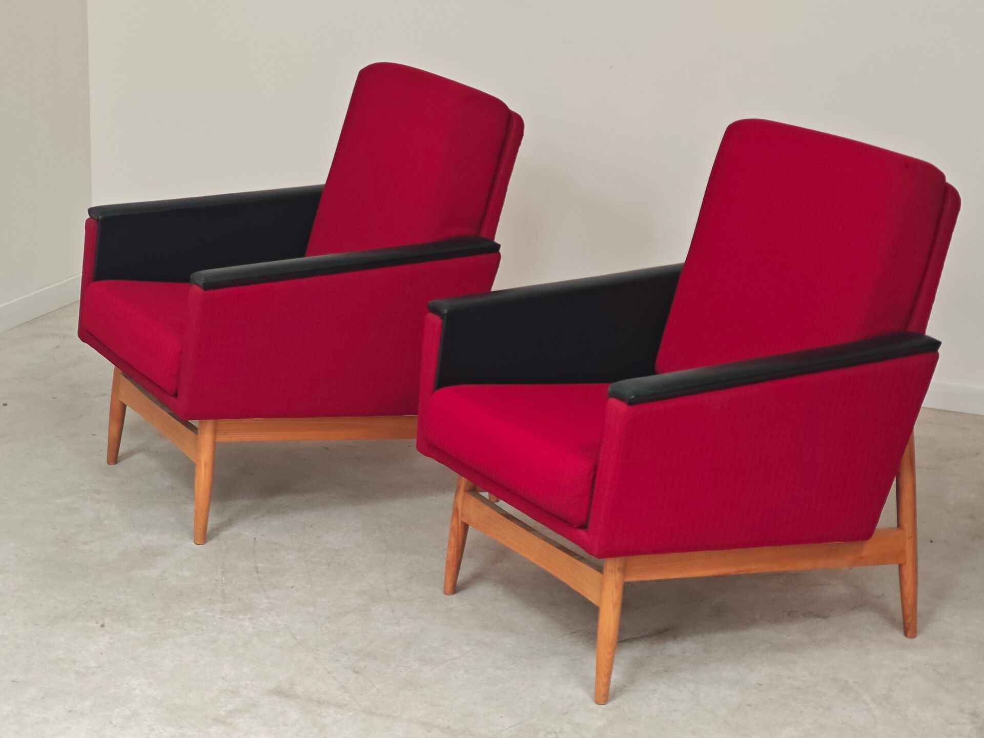 Pair of Drevotex Zamberk armchairs, red fabric and faux leather 1970