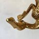 Double coat hook in Hollywood Regency style, brass swan
