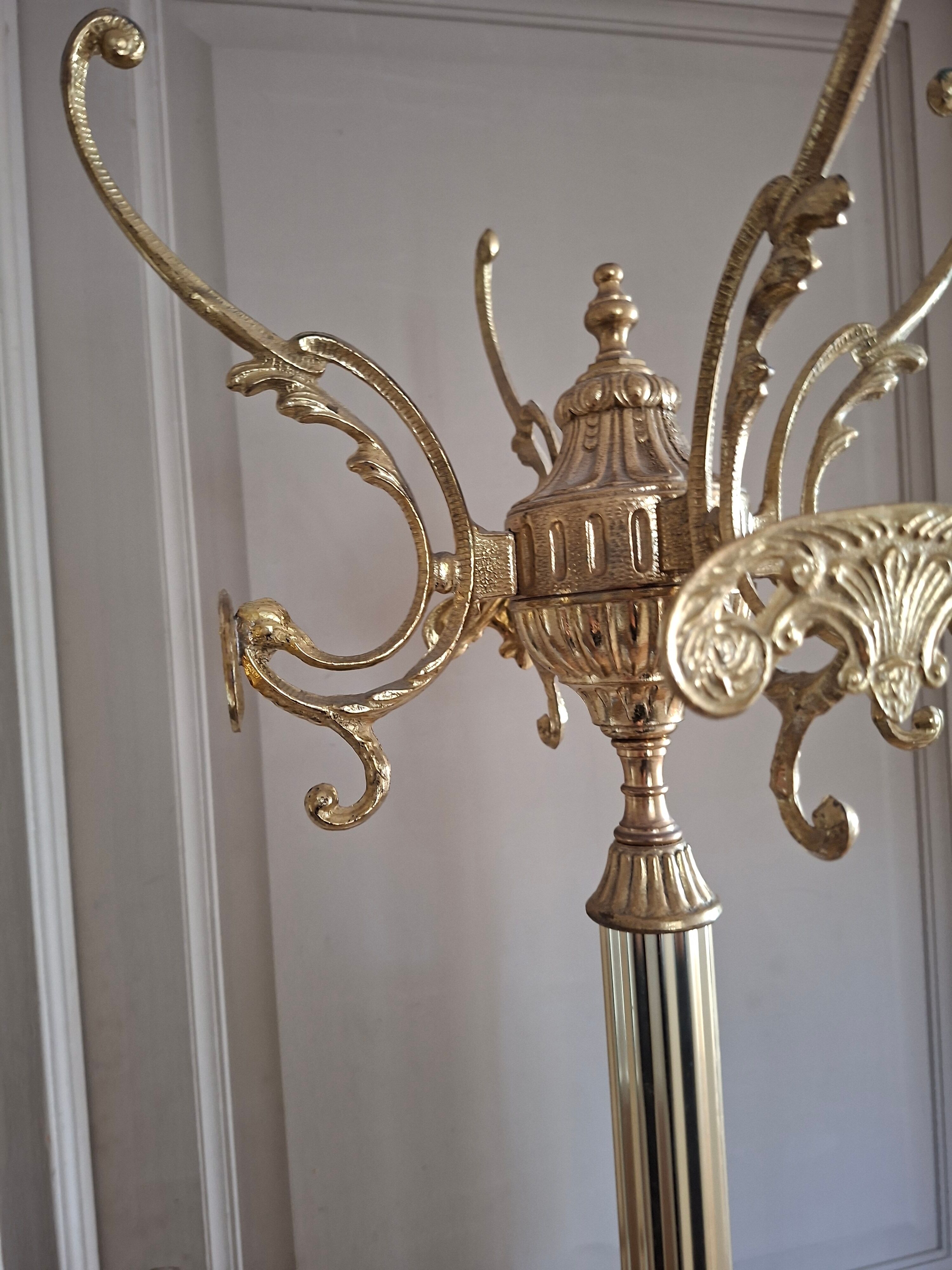 Golden parrot coat rack