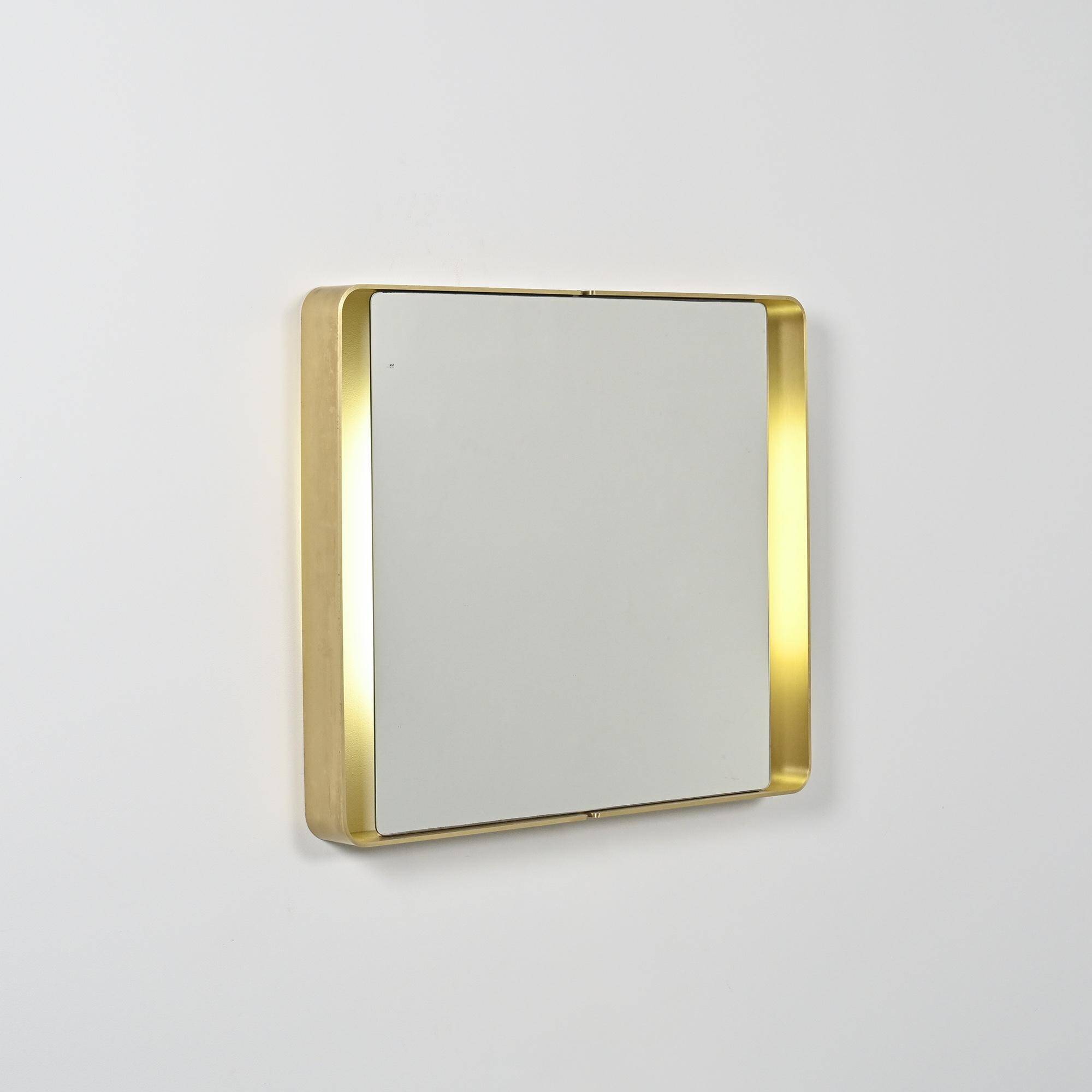Rectangular mirror in gilded metal, circa 1970