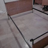 Black metal and rattan bed frame