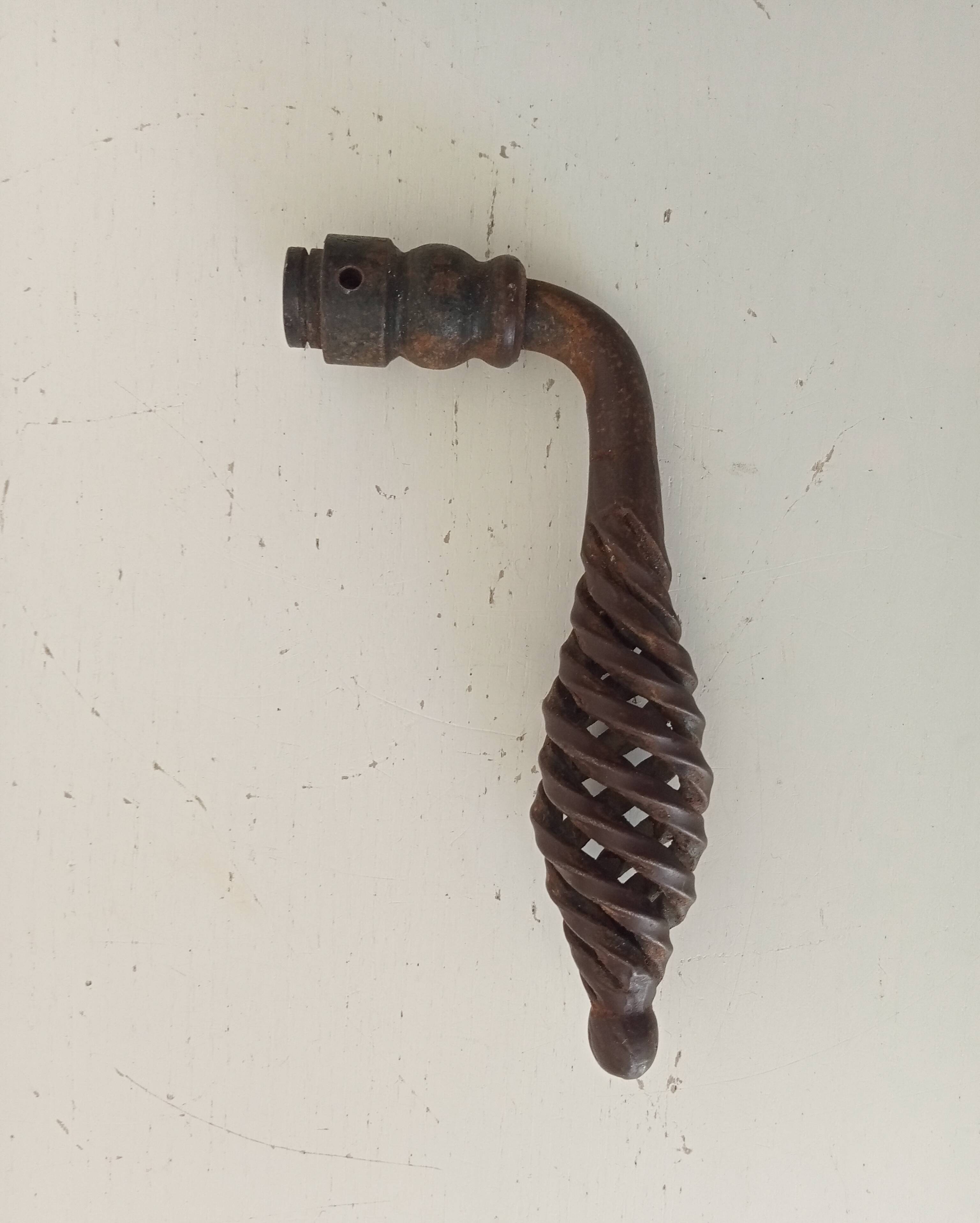 Twisted door handle in solid wrought iron, antique.