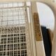 Metal serving trolley on wheels