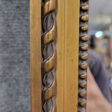 Miroir de style Louis XVI  en bois doré vers 1850