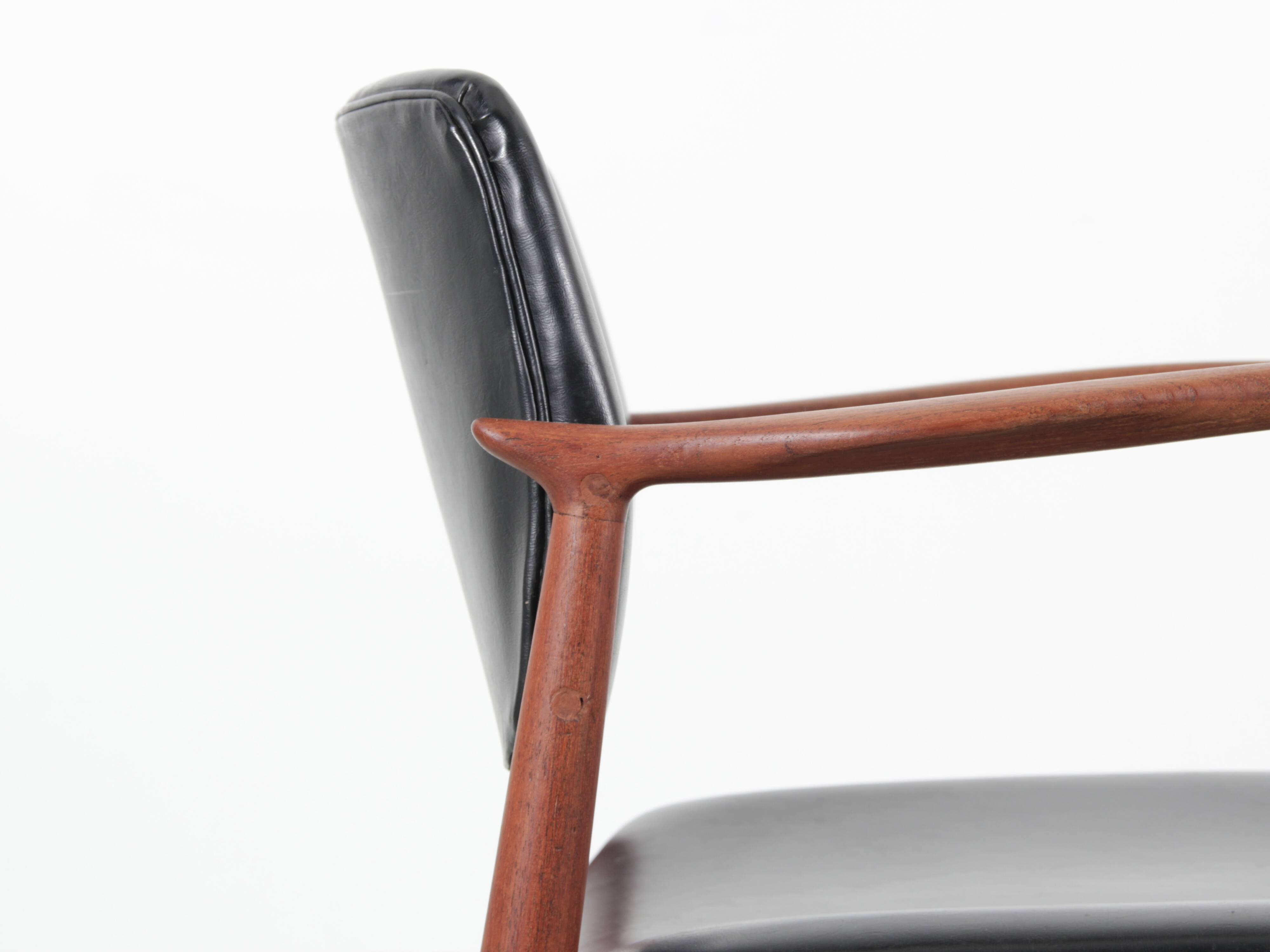 Pair of Scandinavian teak armchairs, model 66