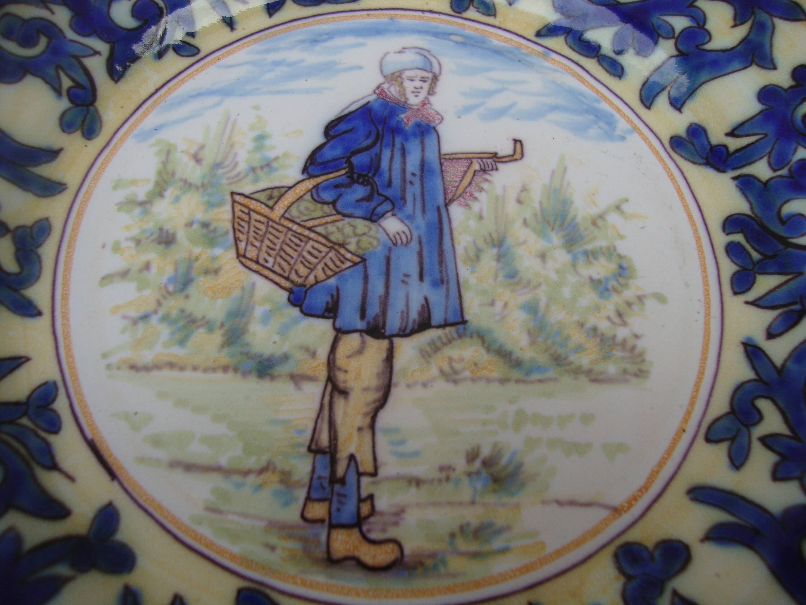 Old earthenware plate decorated with a character marked Le HAVRE