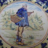 Old earthenware plate decorated with a character marked Le HAVRE