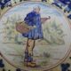 Old earthenware plate decorated with a character marked Le HAVRE