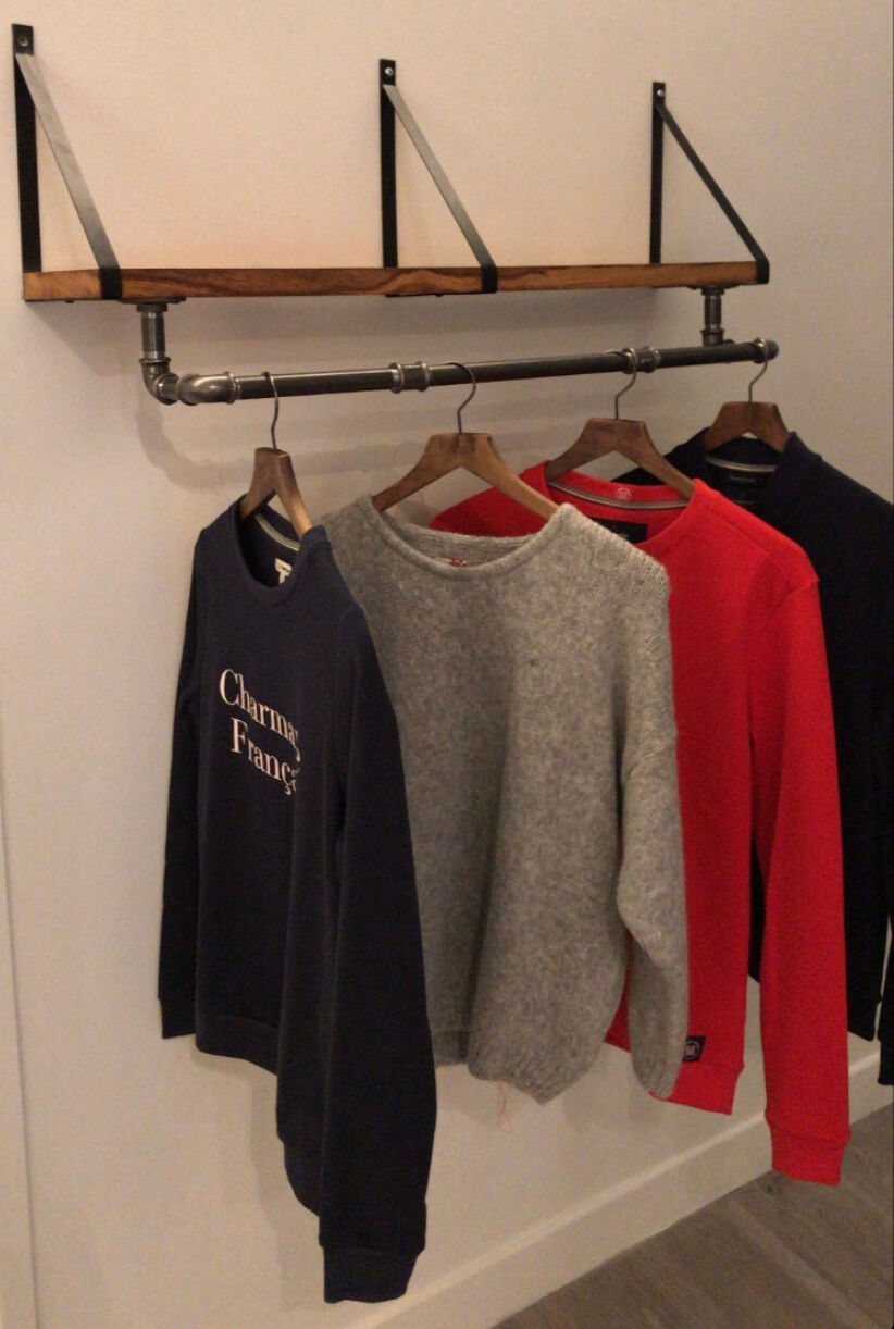 Industrial shelf wearing coat