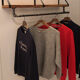 Industrial shelf wearing coat