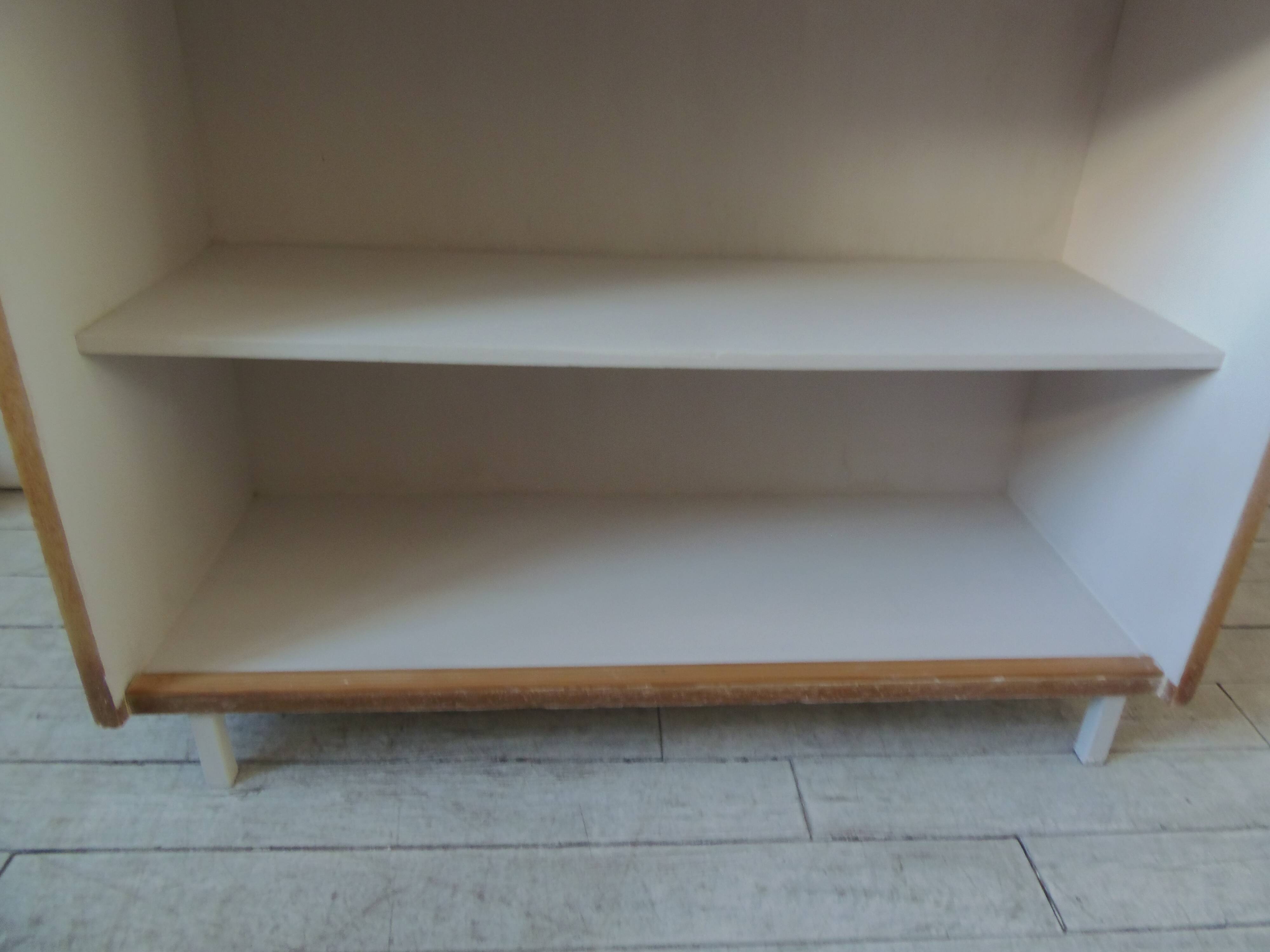 Vintage bookshelf in oak veneer, pearl grey interior, metal legs.