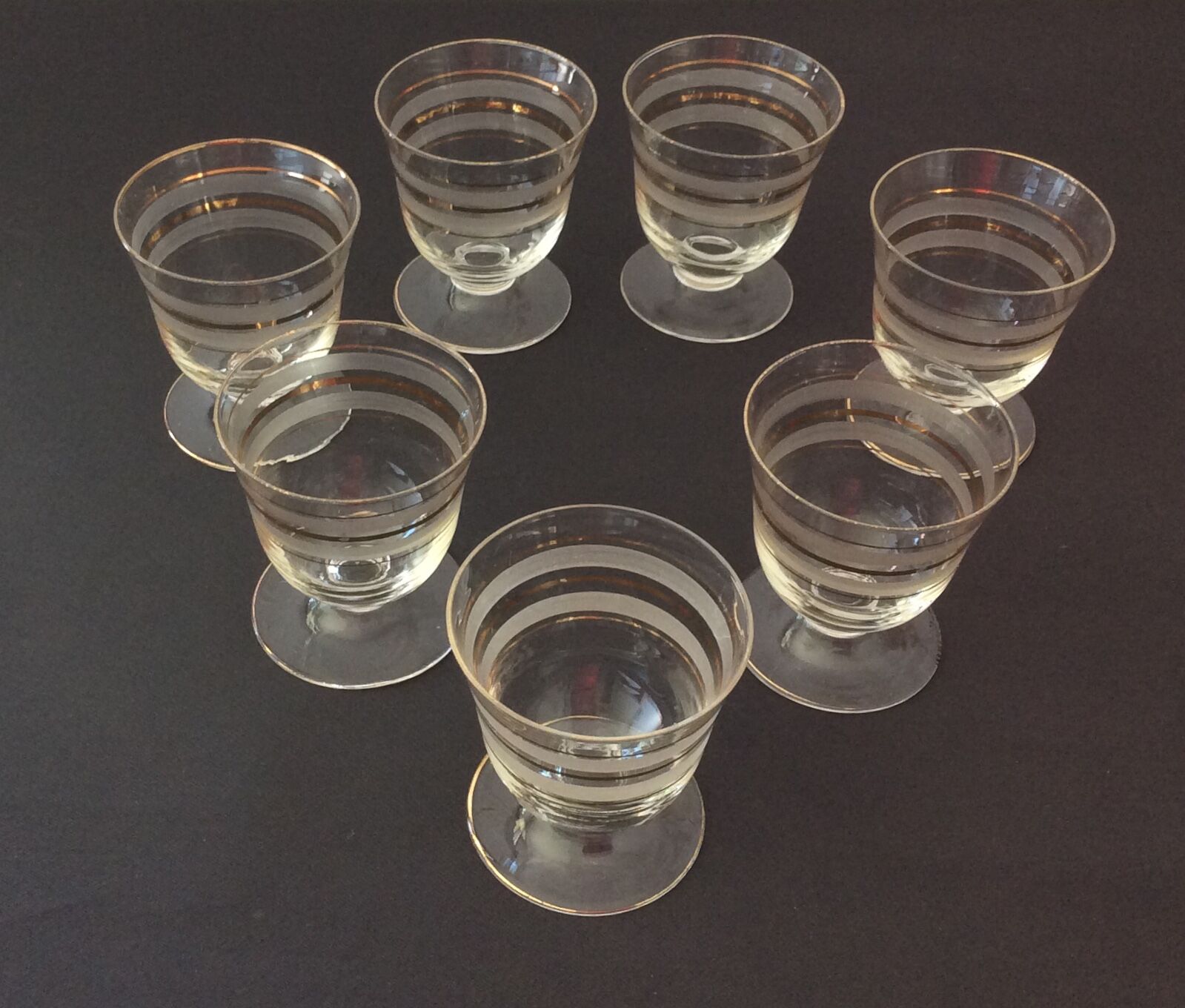 Fine glasses on pedestal with gold border - vintage