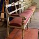 Carved wooden bench, gilded and painted, Italy around 1880, 510cm long.