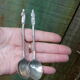 Lot de 2 cuillères souvenir en metal argenté