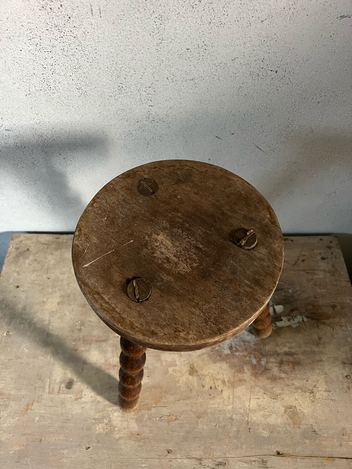 Wooden tripod stool
