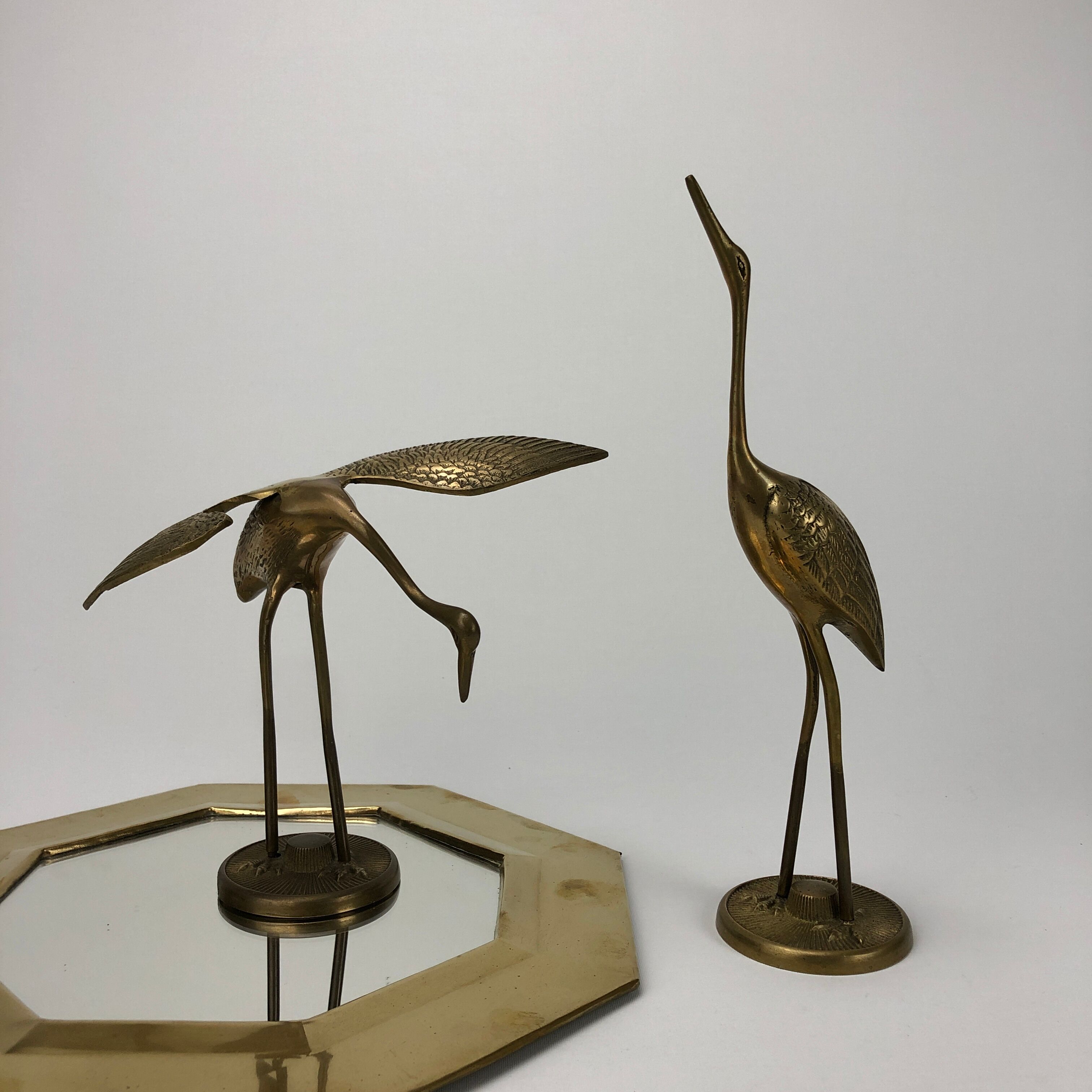 Brass heron couple