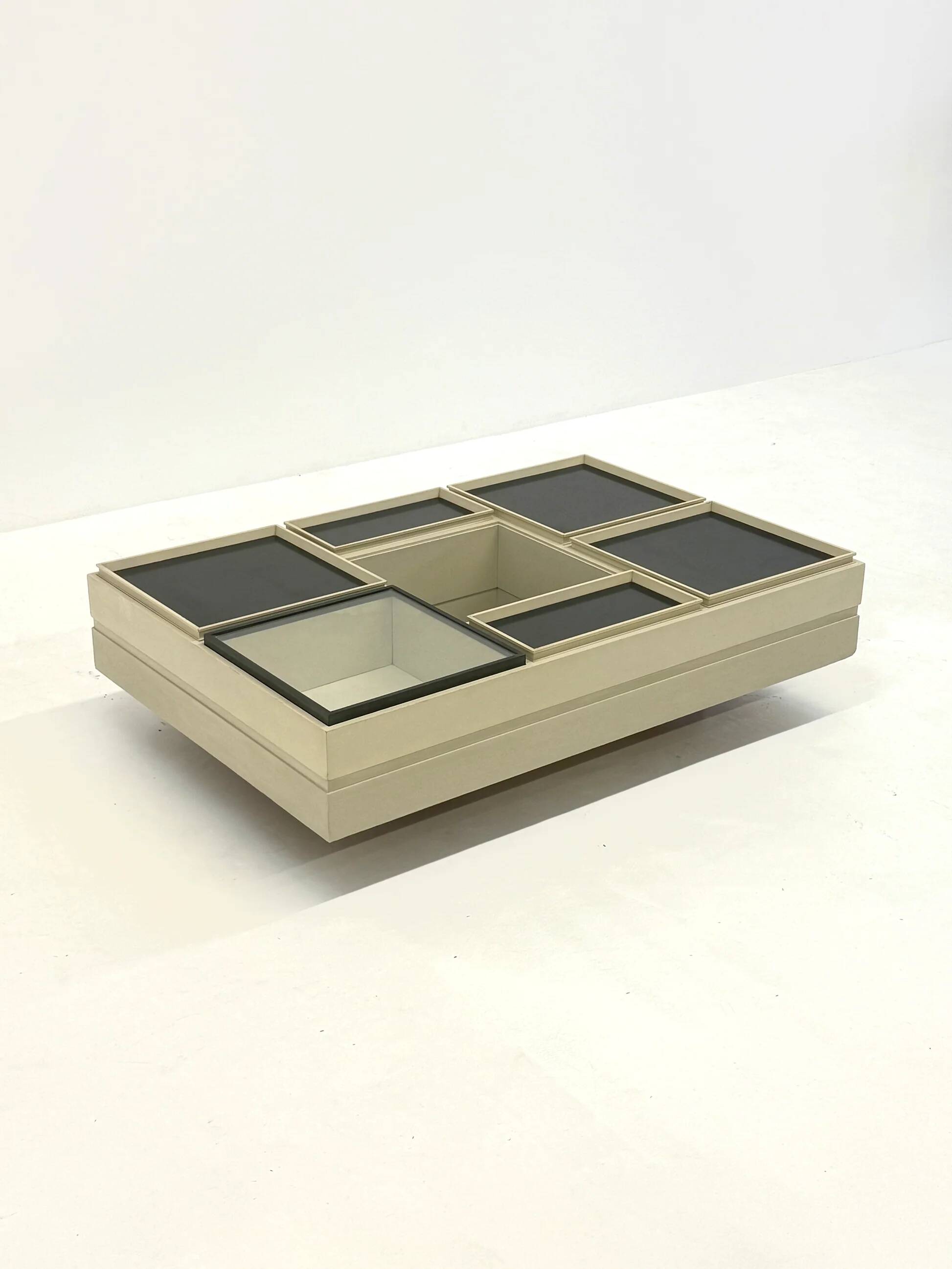Modular white coffee table designed by Carlo Hauner for Forma