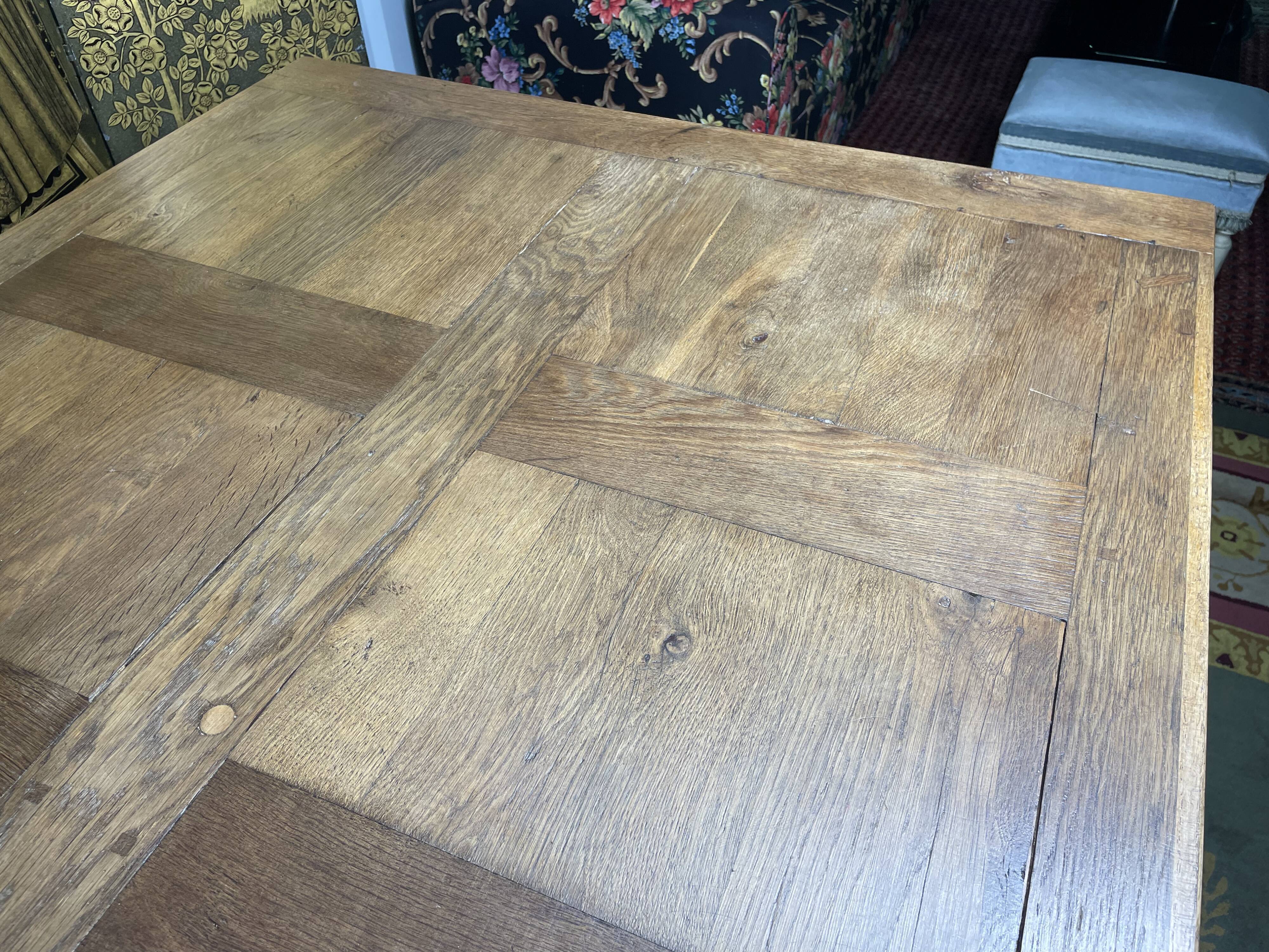 19th century oak farmhouse table with parquet flooring