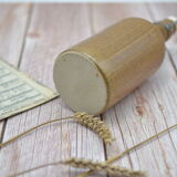 Small wooden sandstone bottle