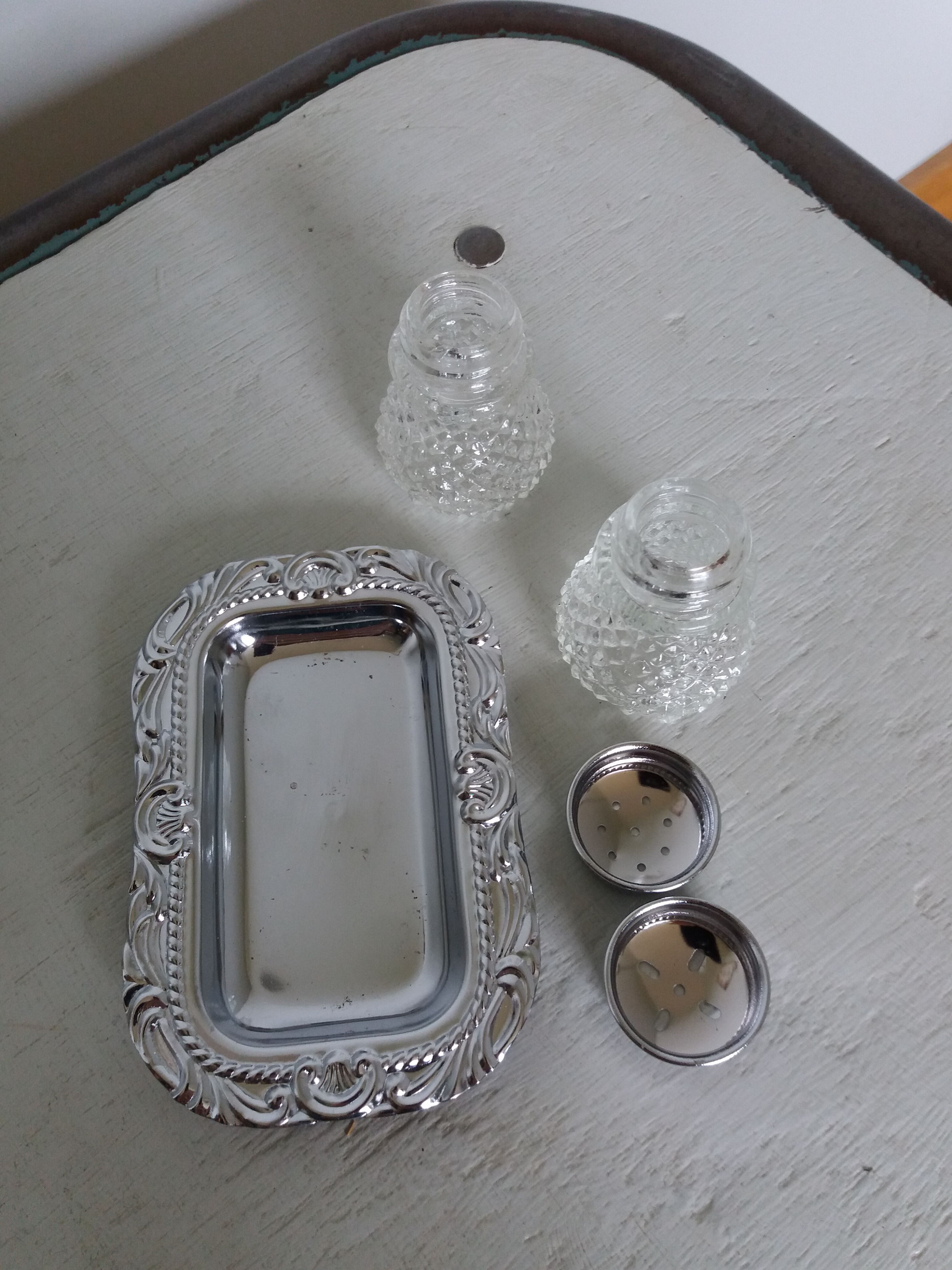 Salt shaker and pineapple shaped pepper