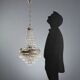 Antique chandelier in the shape of a balloon in silver-plated metal and glass, 20th century.