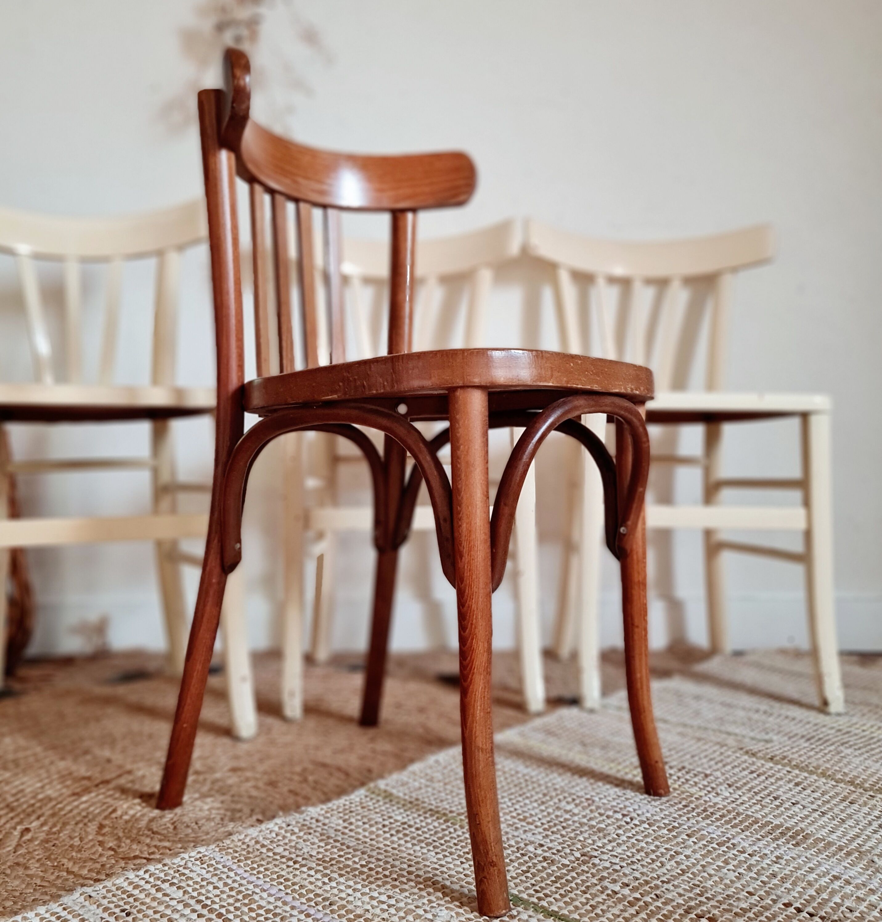 4 mismatched antique bistro chairs