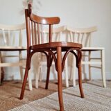 4 mismatched antique bistro chairs