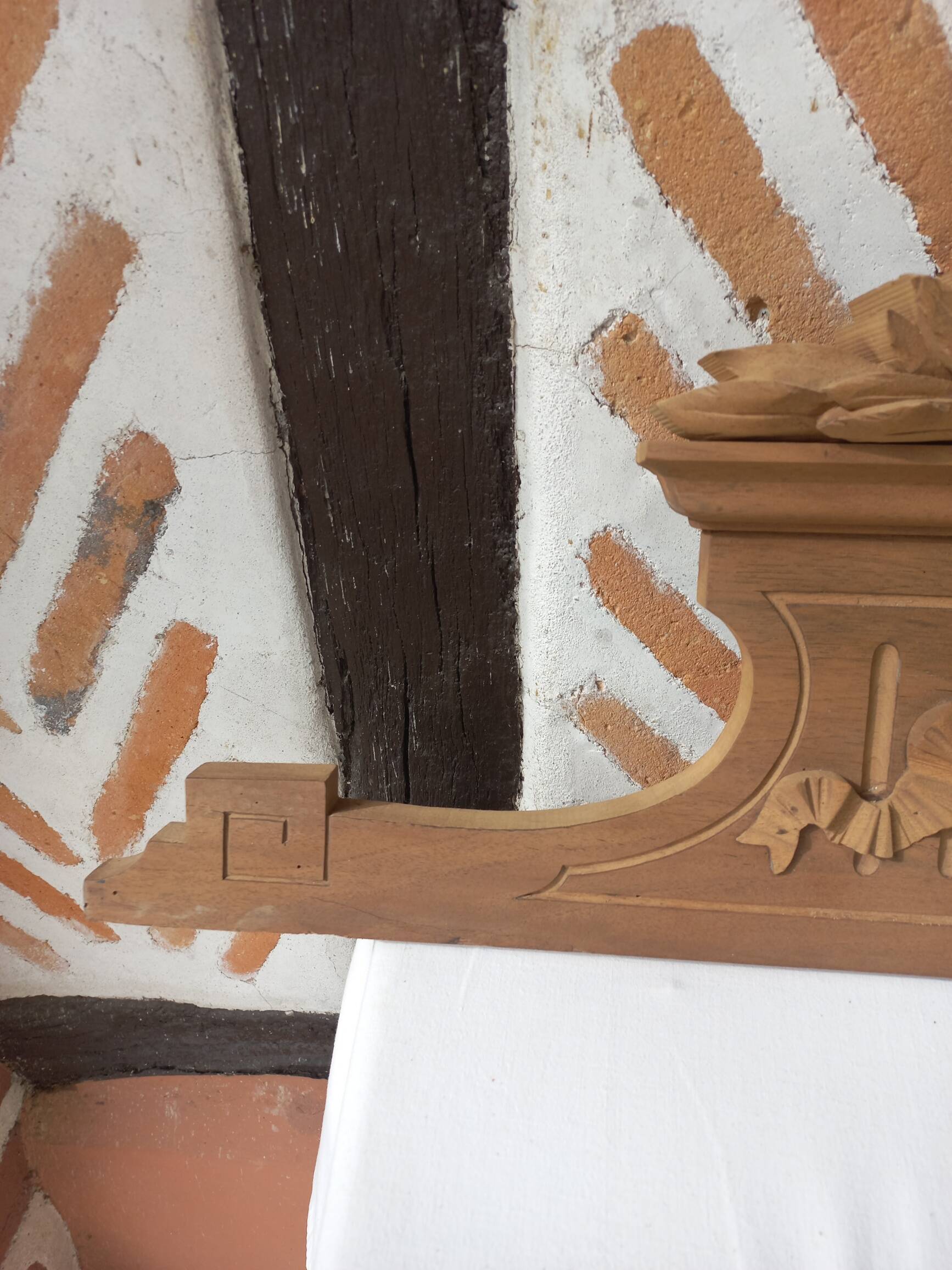 Old sandblasted wooden pediment