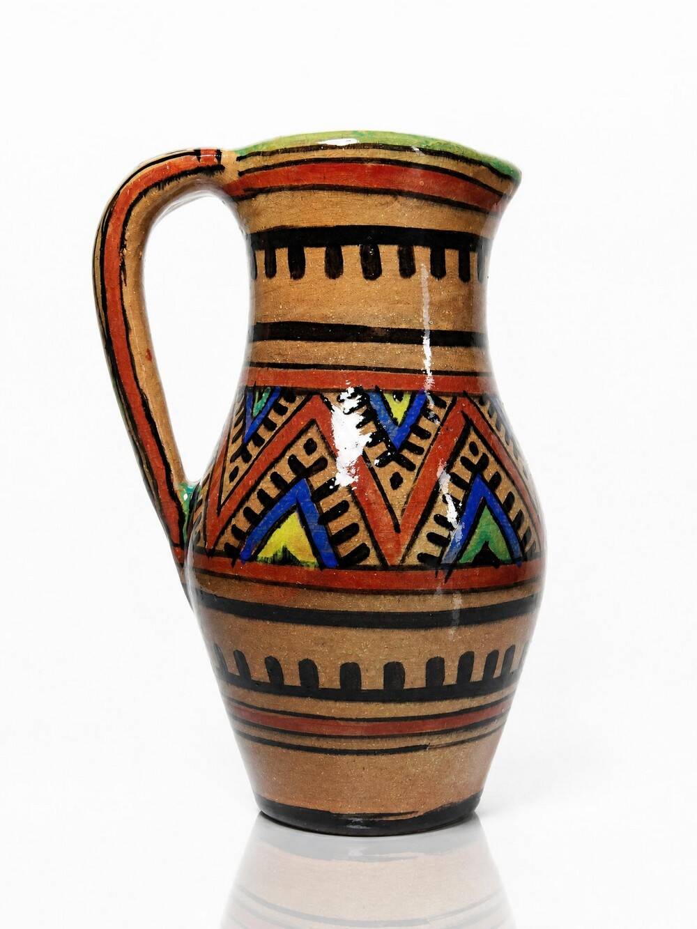 Small Moroccan jug in glazed terracotta, signed, Berber decoration, 20th century.