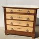 Old chest of drawers with white marble.