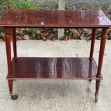 2-level rolling table in lacquered mahogany and brass 1960
