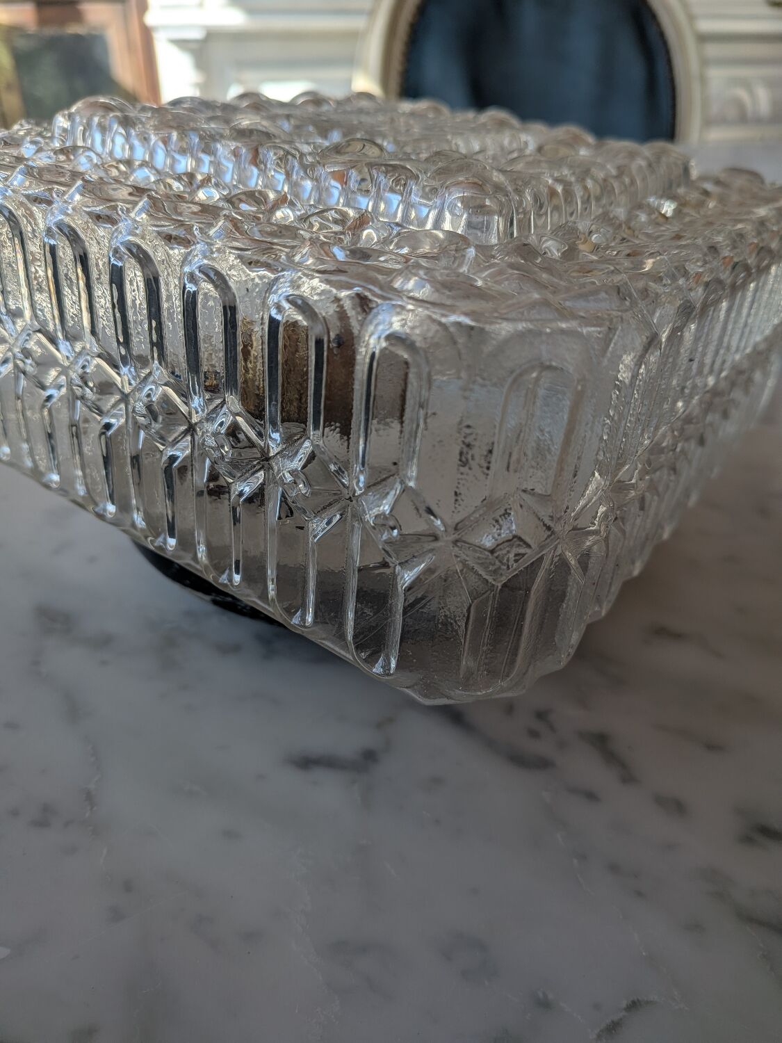 Pressed glass wall light