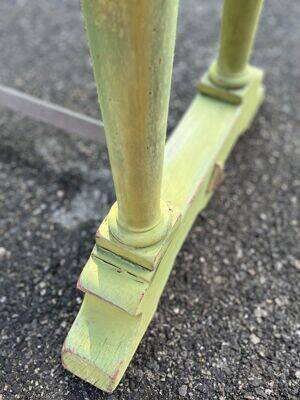 Old table with patinated green legs