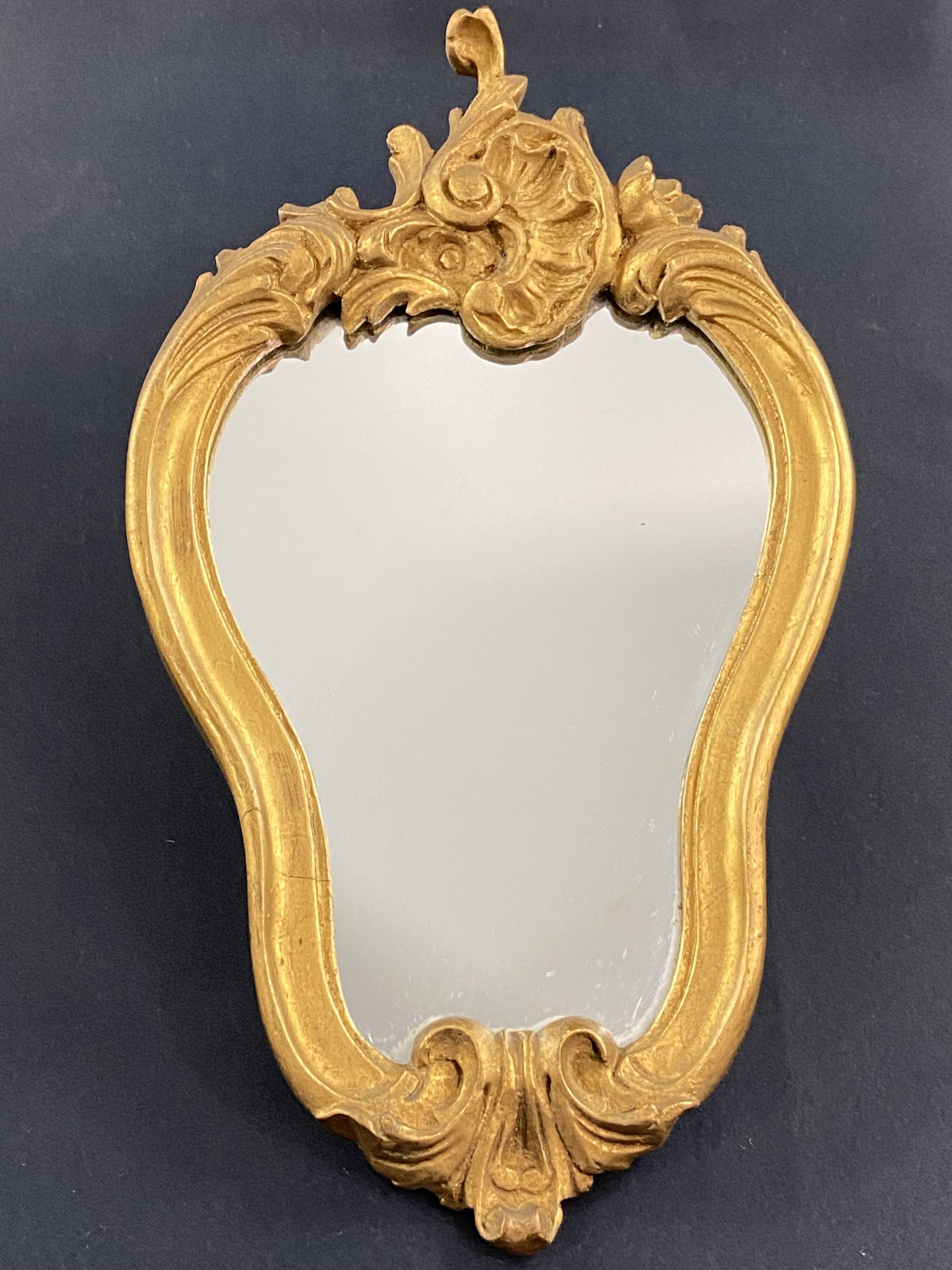 Violin mirror with shell decoration