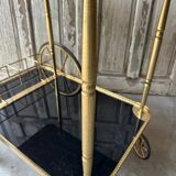 Vintage black and gold rolling trolley