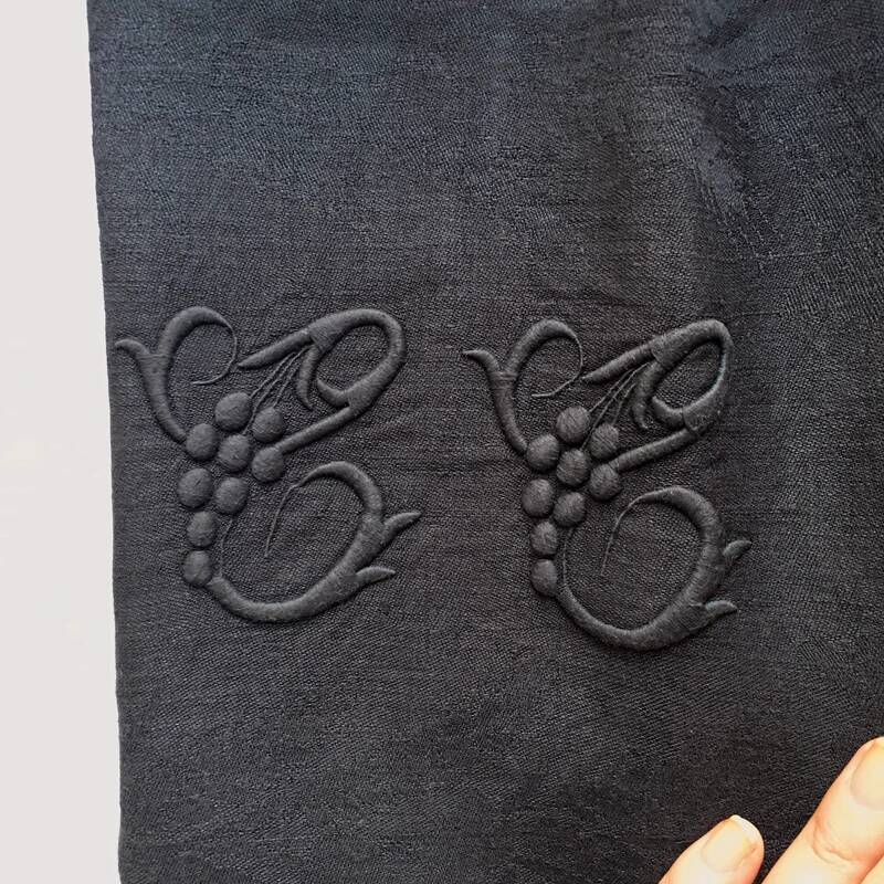 Old embroidered table napkin C C Black