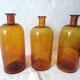 Trio pharmacy bottles