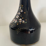 Black vase with flowers