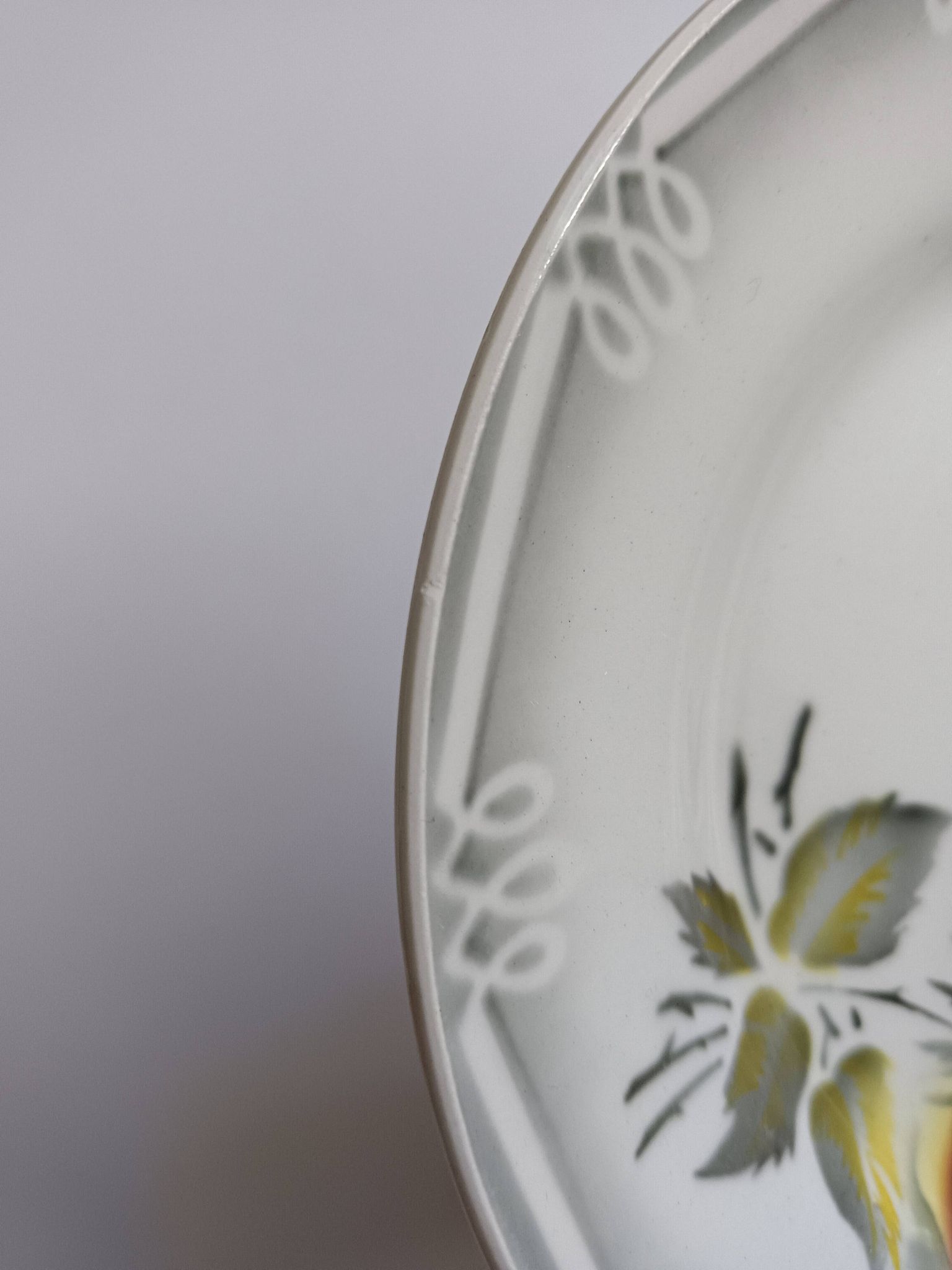 3 Digoin Sarreguemines Adèle plates in grey, yellow, and burgundy.
