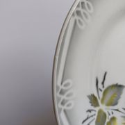 3 Digoin Sarreguemines Adèle plates in grey, yellow, and burgundy.