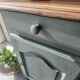 Small vintage side table in sage green patina and solid wood.