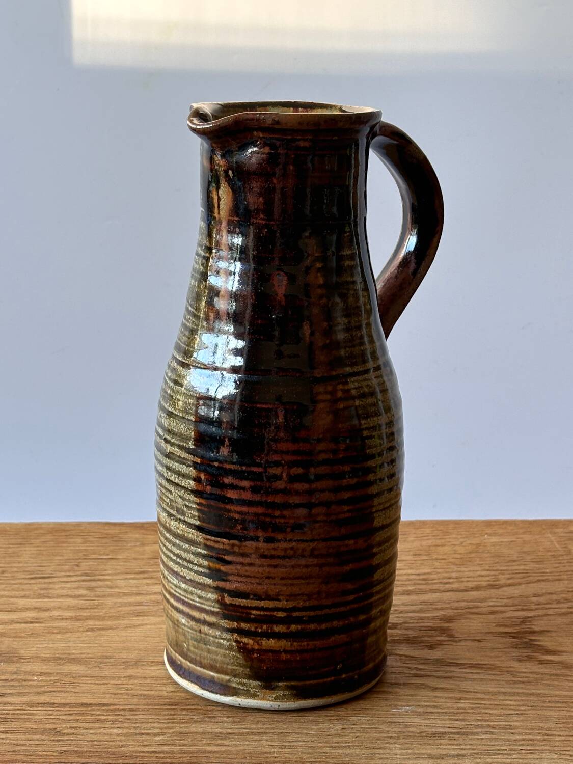 Vintage enameled stoneware pitcher